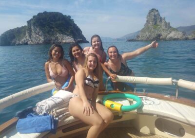 happy friends during a boat tour