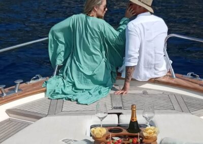 couple during a romantic Positano boat tour